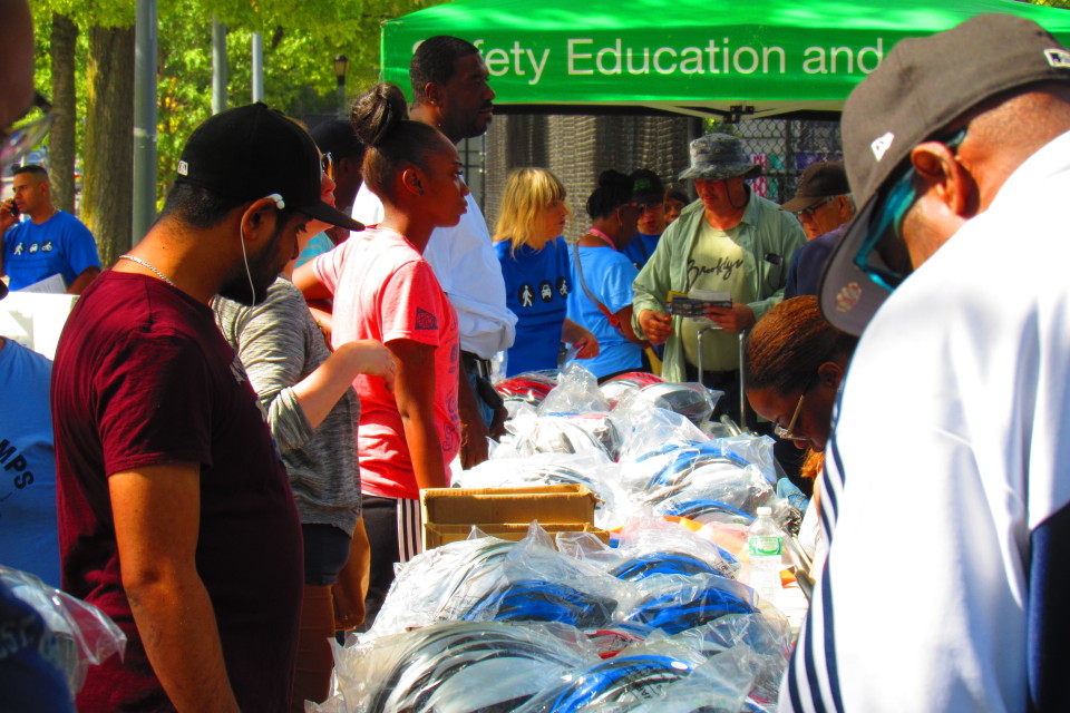 NYC DOT provided hundreds of helmets to give out to residents of BedStuy.