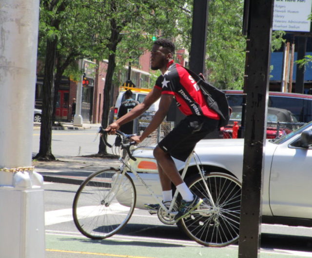 black man on bike